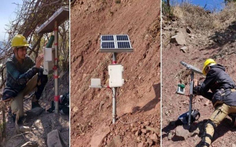 IIT Mandi field engineers installing solar-powered landslide sensor nodes on a Himalayan hillside
